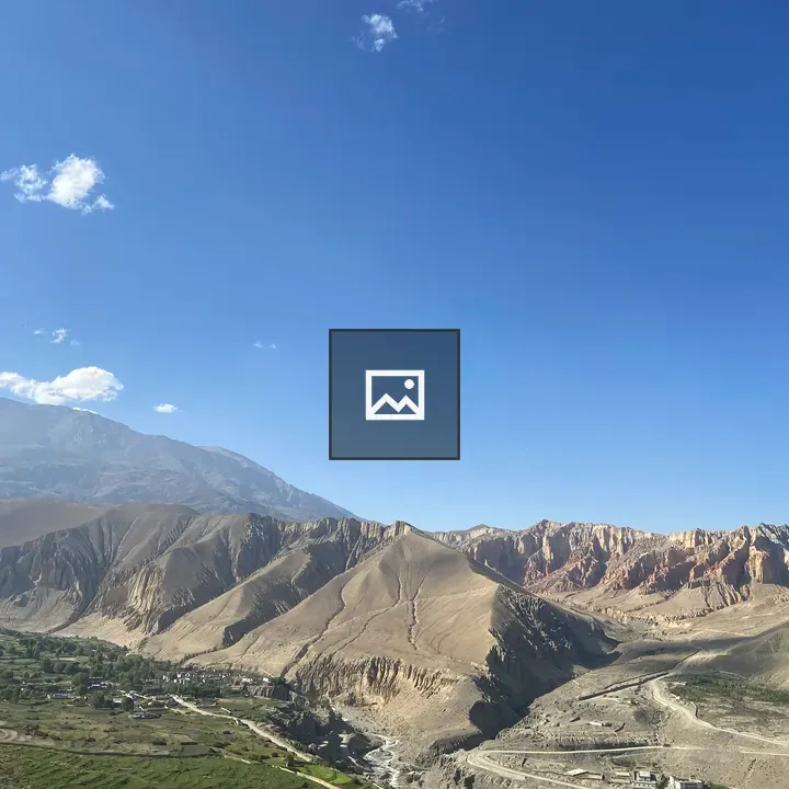 Grey Mountains Under Blue Sky