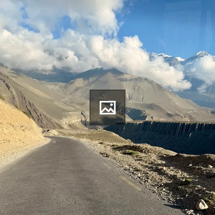 Mountain road under blue sky