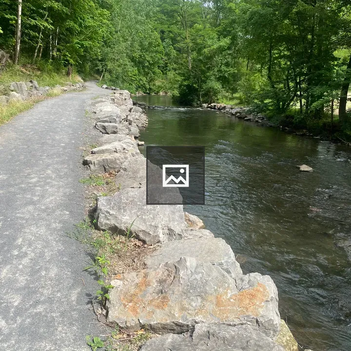 Trail walk way beside stream