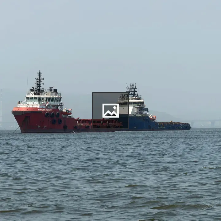 Two tugboats offshore in India