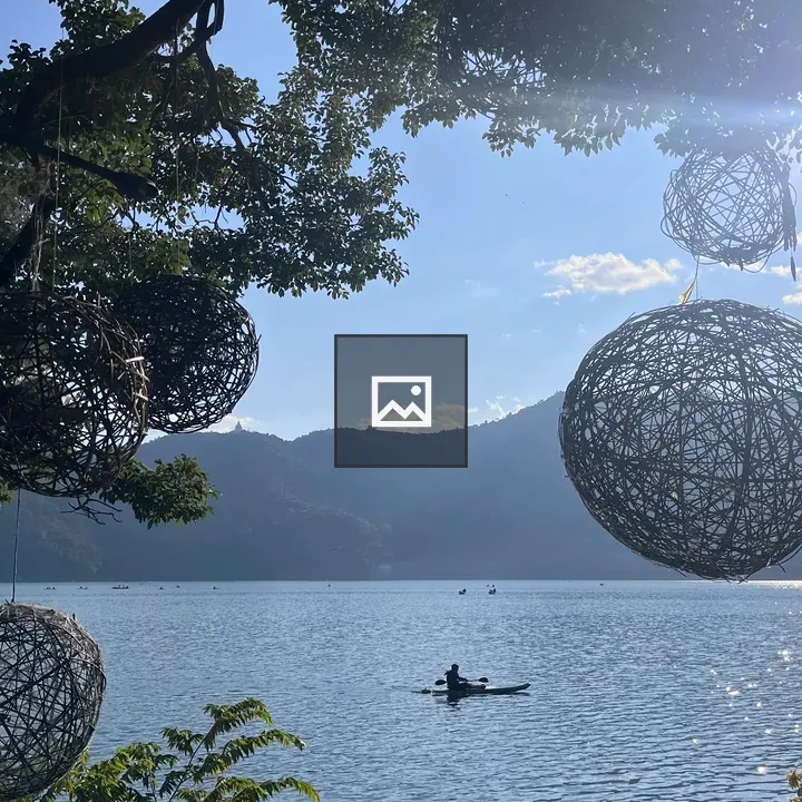 Serene lakeside landscape with hanging decor