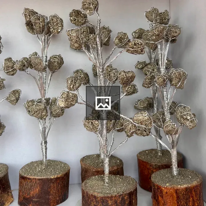 Silver trees on wooden bases