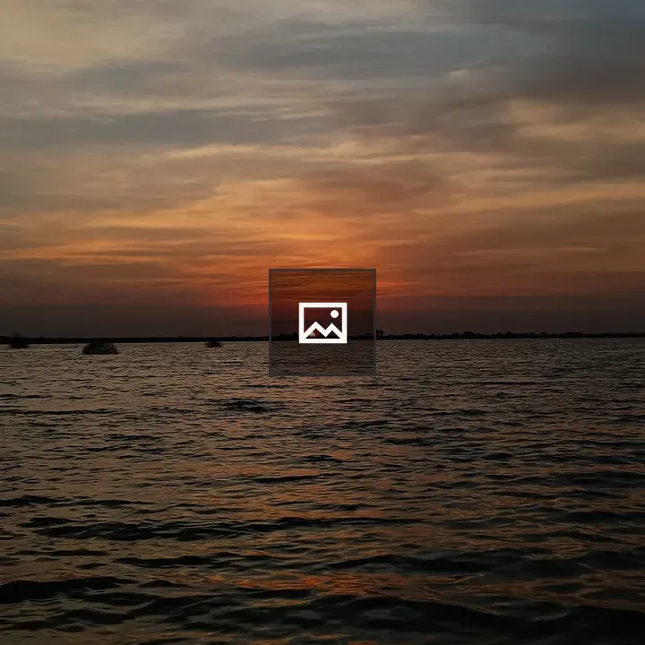 Sunset over the lake horizon