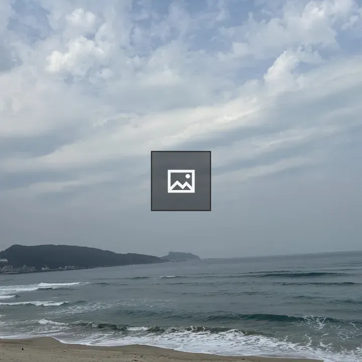 Beach with distant coastline