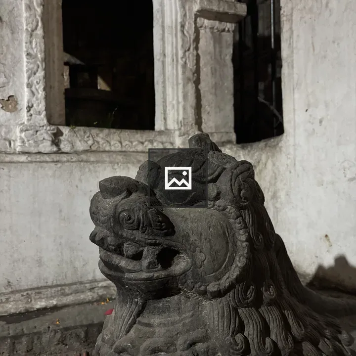 Stone statue of mythical guardian lion