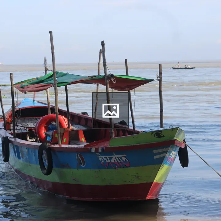 Colorful wooden boat in calm waters