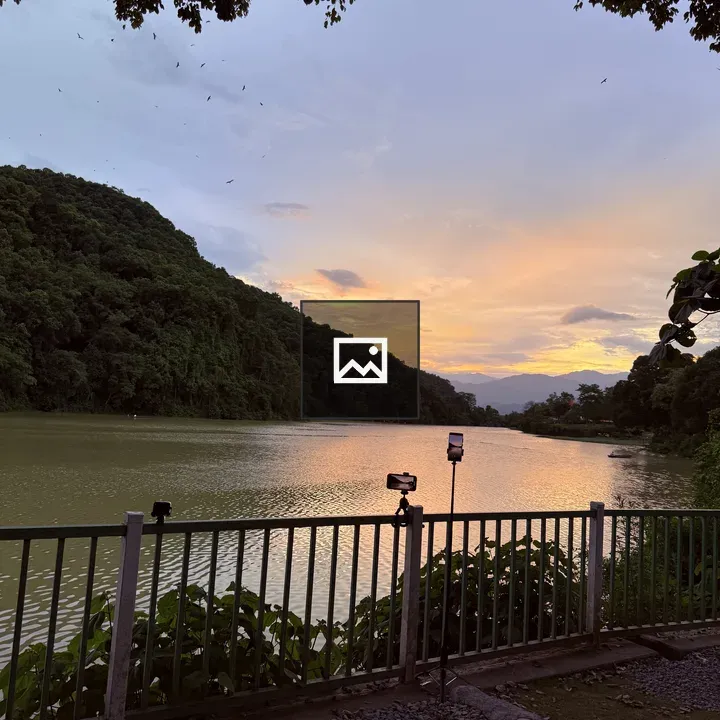 Riverside Sunset Scene