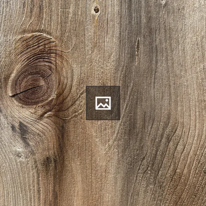 Faded wood grain with knot