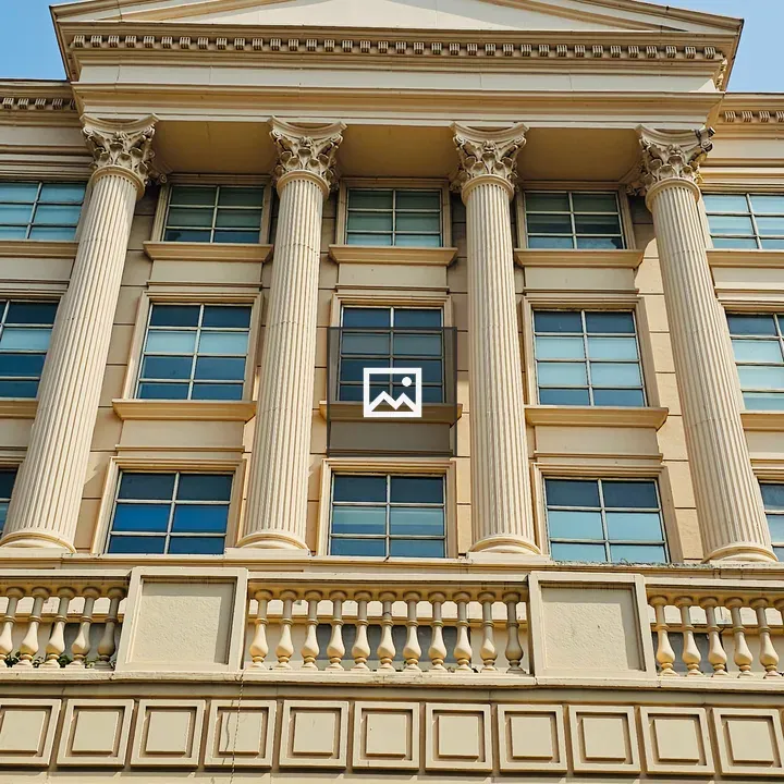 Modern cream building with pillars