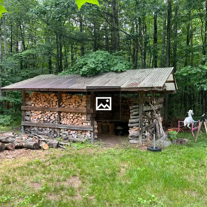 Woodshed with Winter Wood Storage