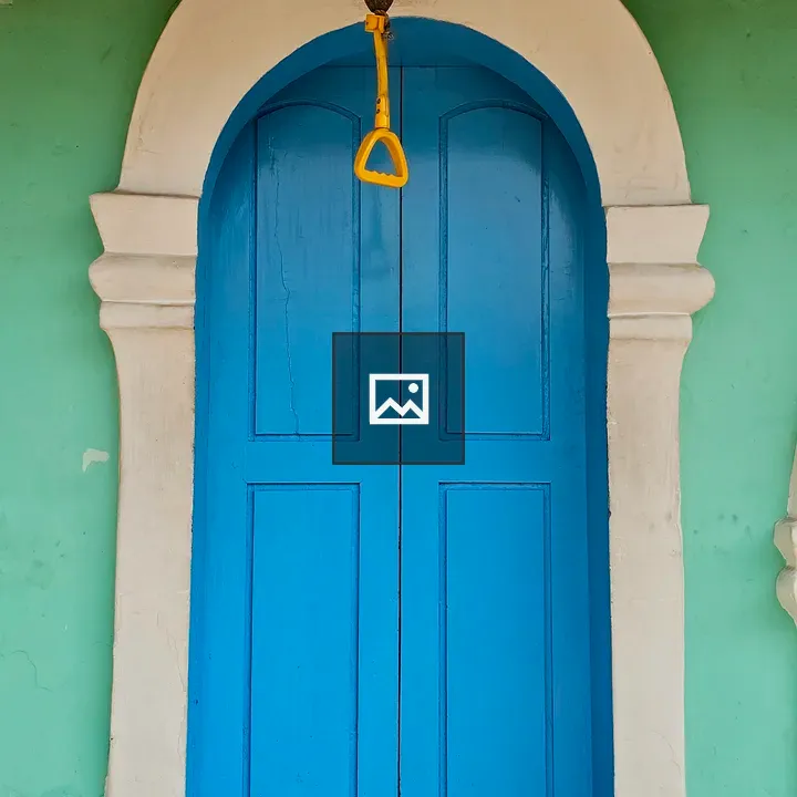 Blue Door in White Arch
