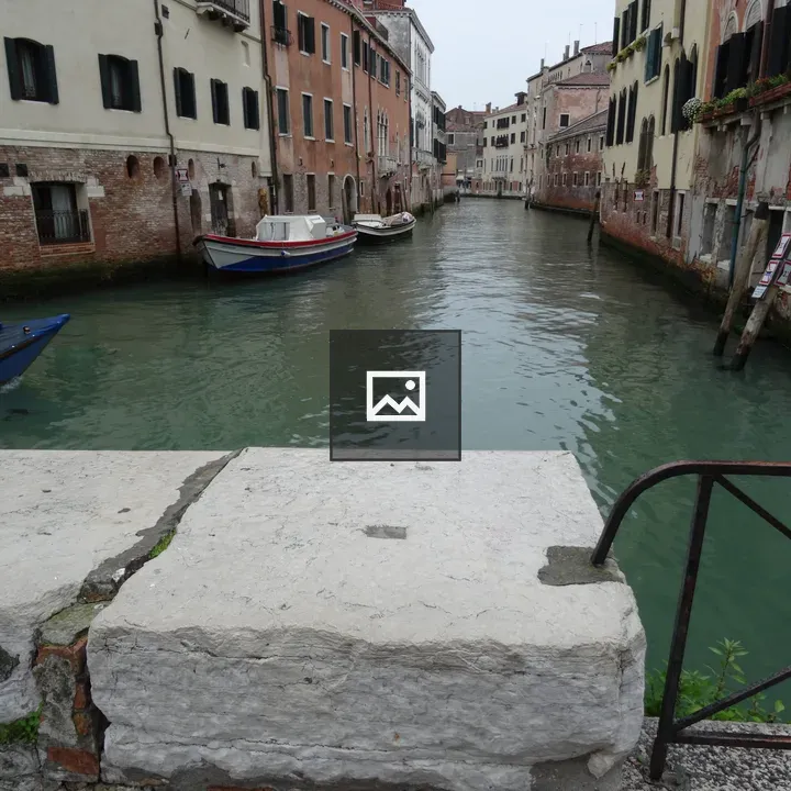 Canal view in Venice with boats