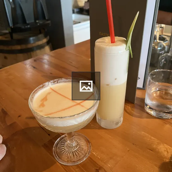 Two cocktails on table
