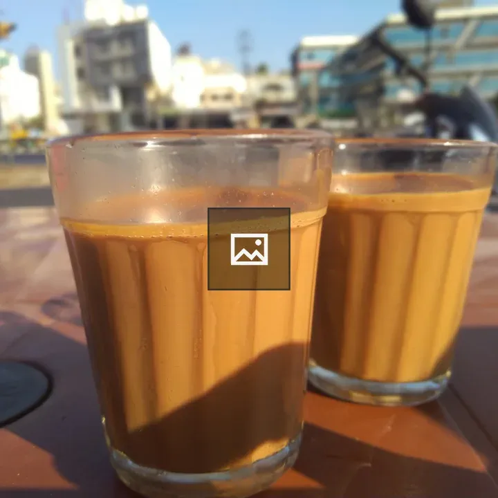 Two glasses of tea on table