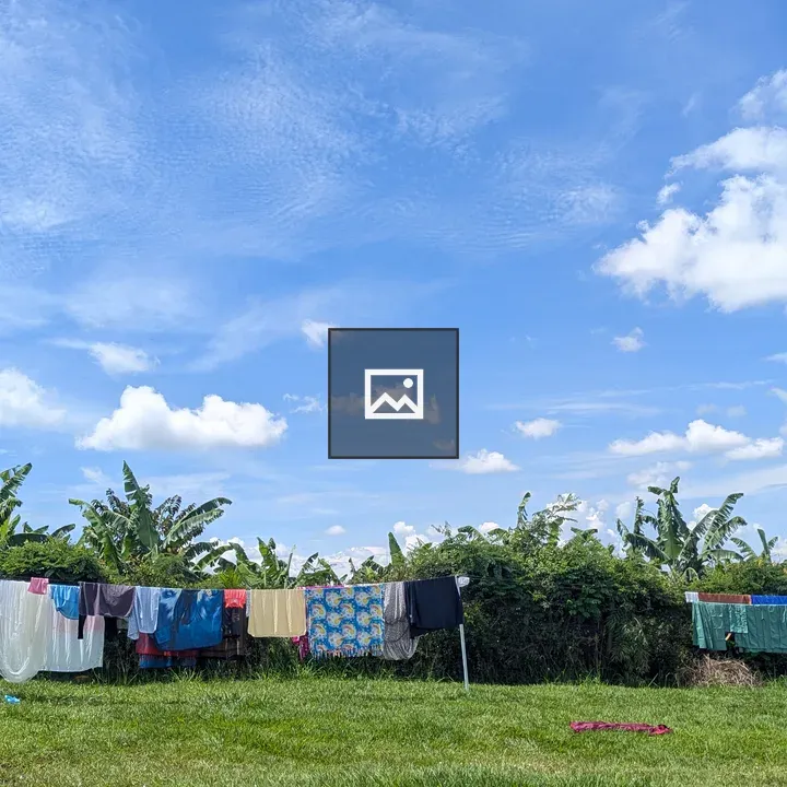 Clothes on a line under blue sky