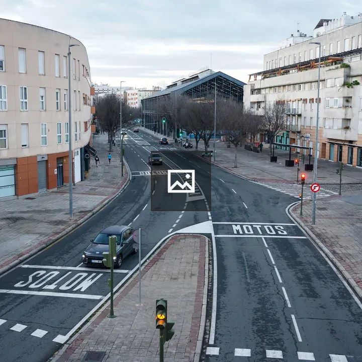 Street view with marked lanes and buildings