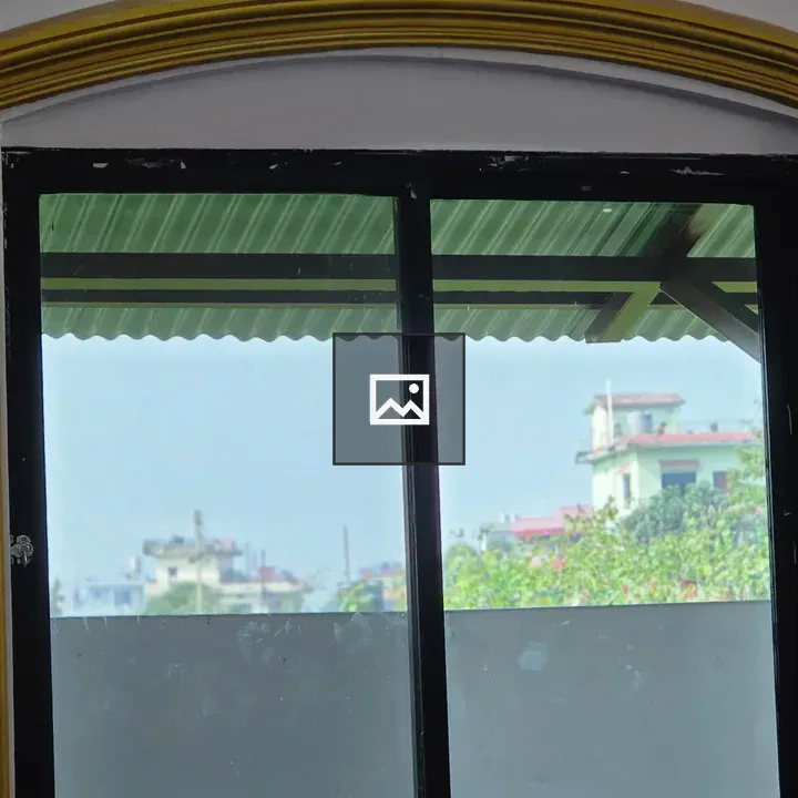 Window with Black Frame and Gold Accents