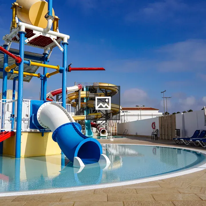 Water play structure by pool