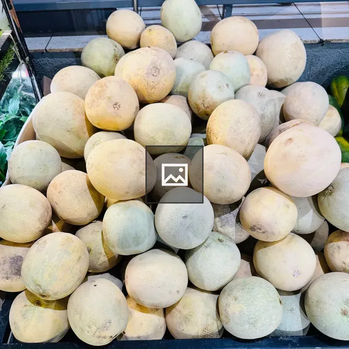 Pile of cantaloupes on display