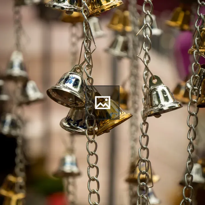 Small gold and silver bells at temple