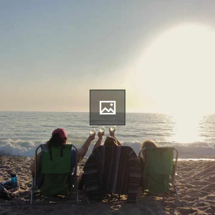 Best friends toast at the beach