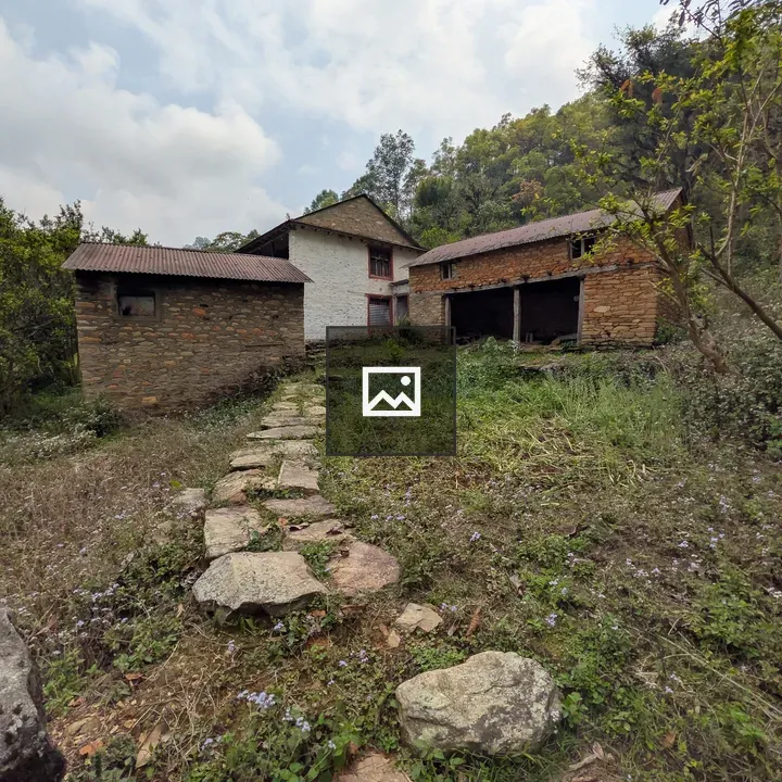 Rustic stone path to farmhouse