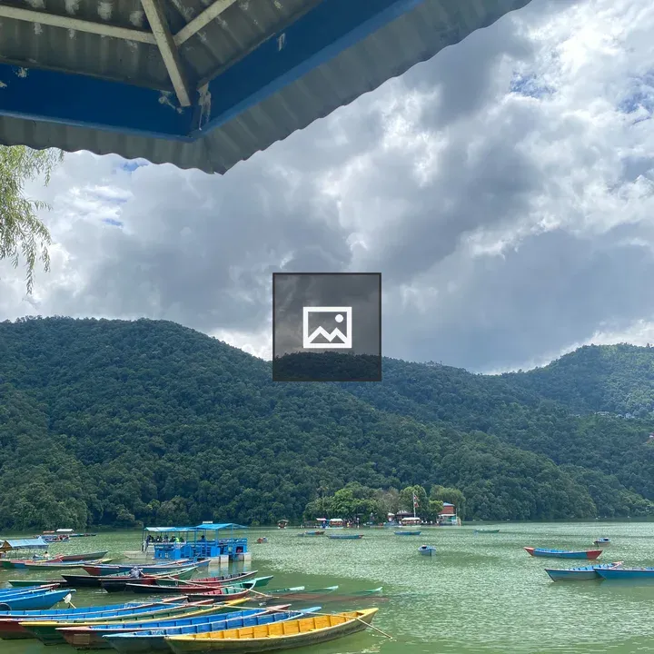 Colorful boats on calm lake