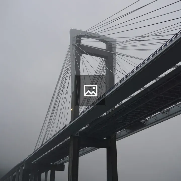 Cable-stayed bridge against overcast sky