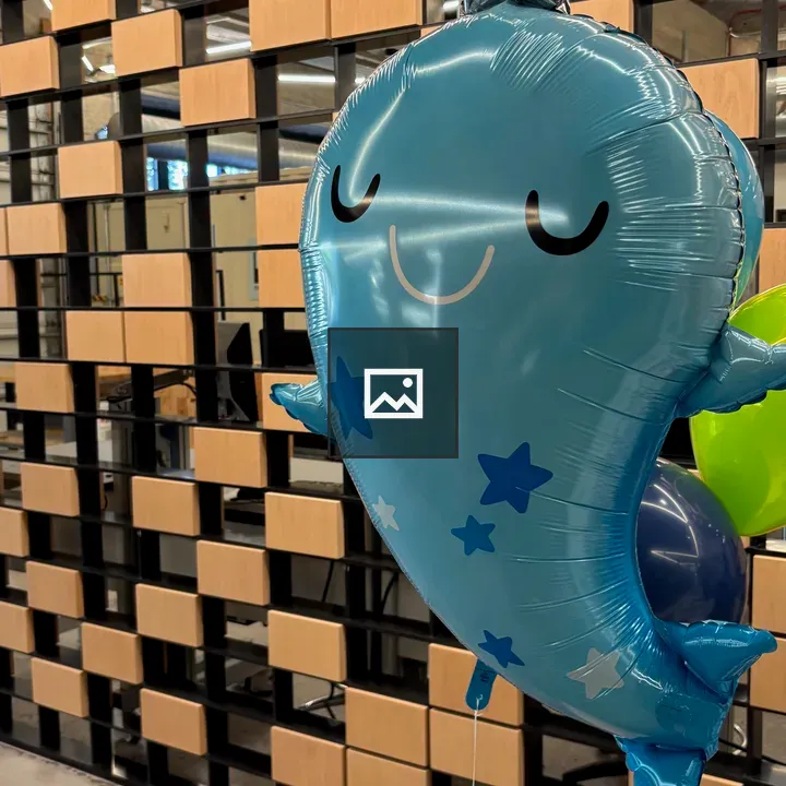 Narwhal balloon in wooden pattern