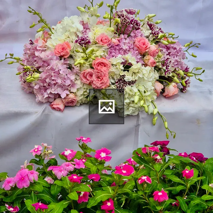 Floral arrangement with pink and white roses