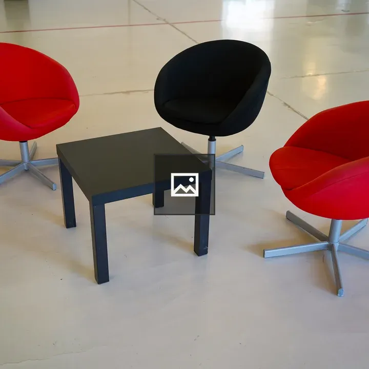 Three swivel chairs around table