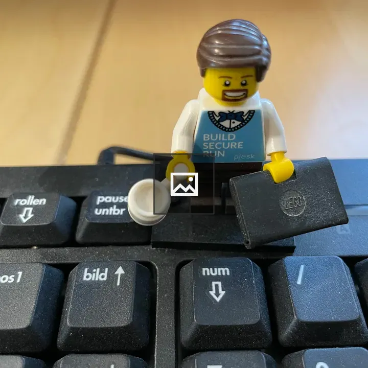 Lego figure on keyboard