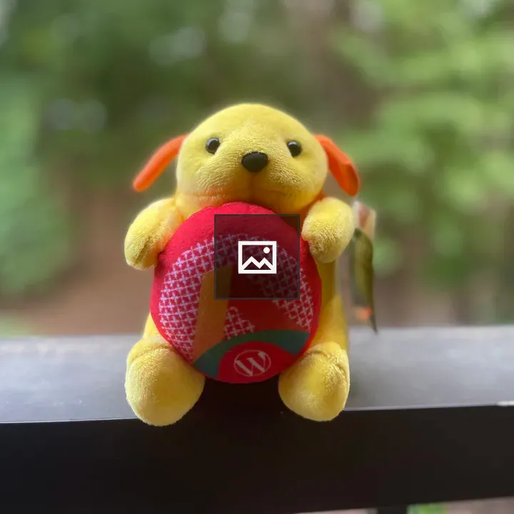 Wapuu on a Ledge