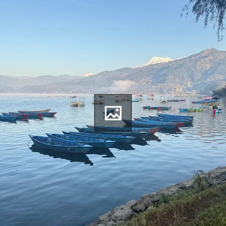 Colorful boats on calm lakeside