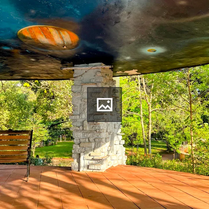 Stone pillar with planetary roof