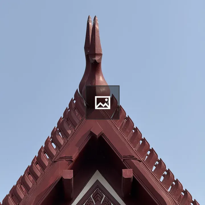 Red Peak Roof with Bird Finial