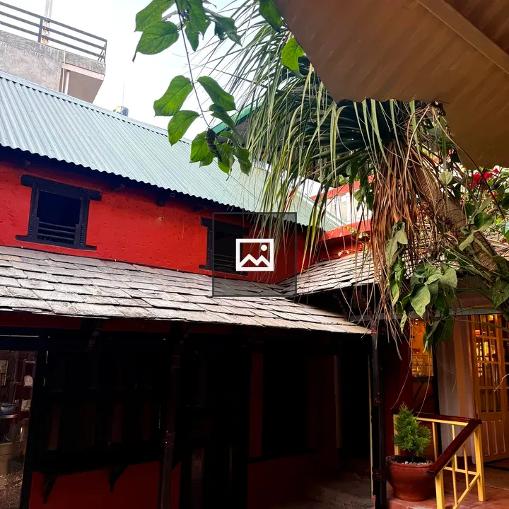 Colorful courtyard with red building