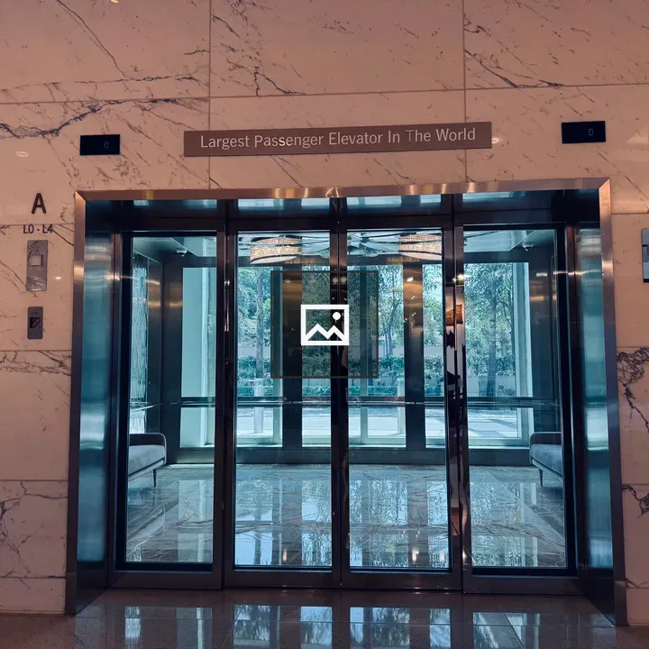 Glass elevator in lobby