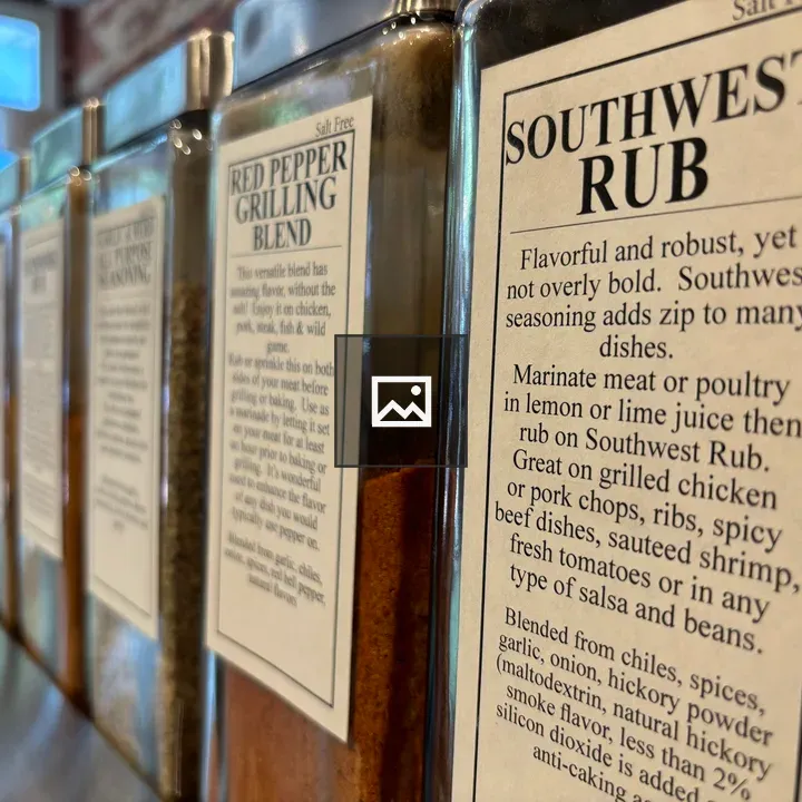 Row of spice jars on rack