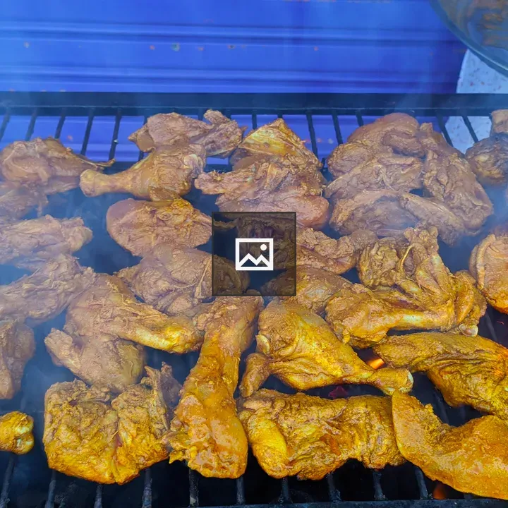 Grilled chicken on open flame