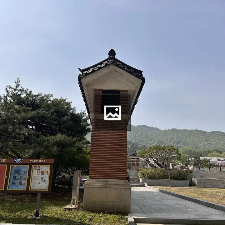 Tall traditional structure with tiled roof