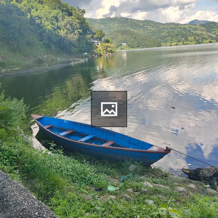 Blue Boat by Lakeside