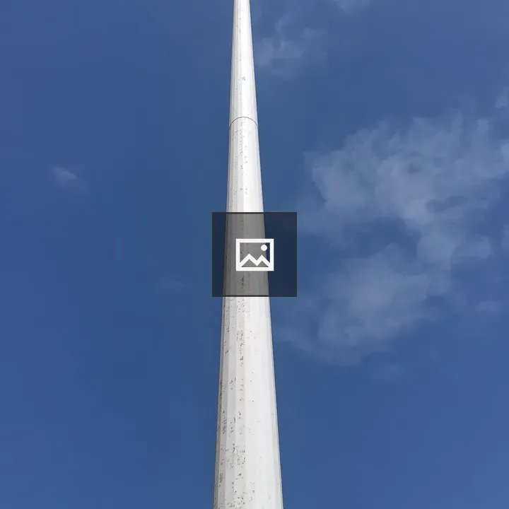 Light tower by blue skyline
