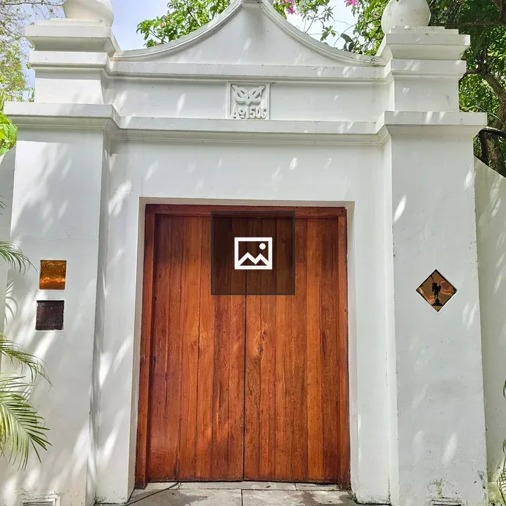 Wooden gate with archway