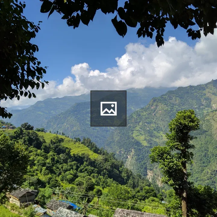 Hillside village with stepped fields