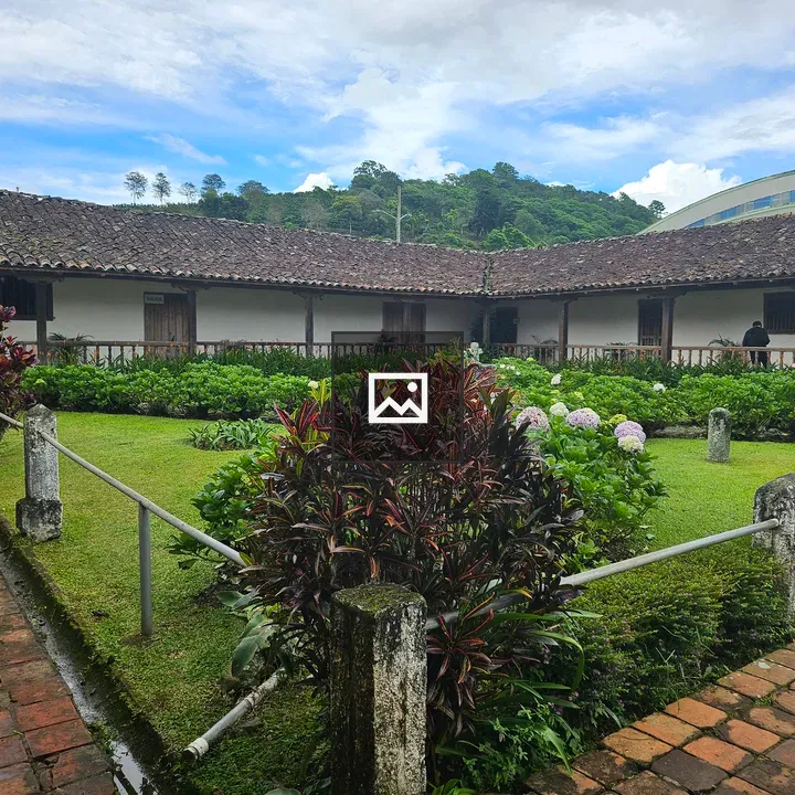 Colonial courtyard with hydrangea gardens