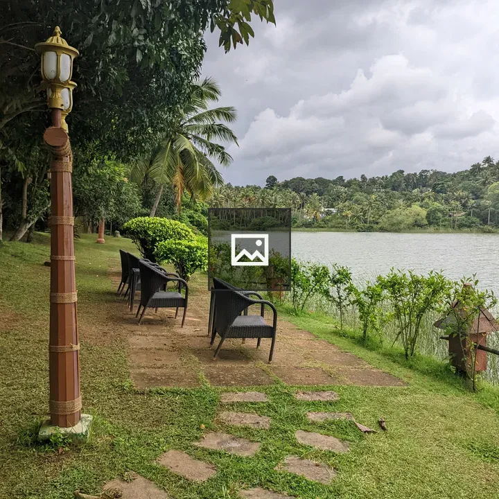 River view from riverbank with chairs