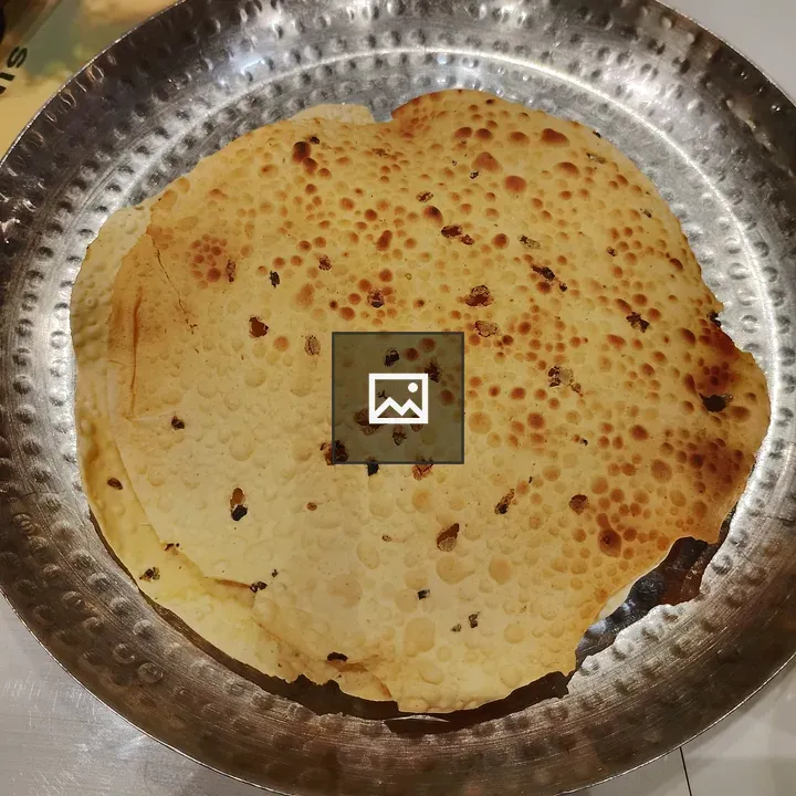 Papadum on Silver Plate