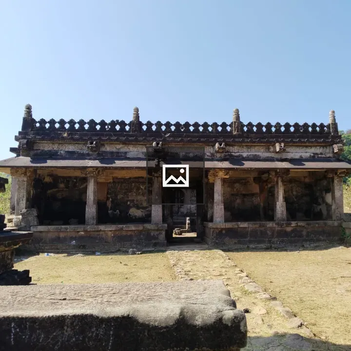Ancient stone temple with weathered pillars