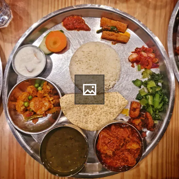 Chutney and Dishware on Table